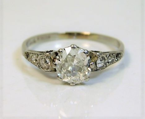 An antique 18ct white gold ring set with approx. 1.3ct centre diamond with diamonds on shoulders 3.2g size R/S