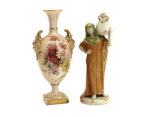 A Royal Worcester porcelain vase1899, with floral decoration on a blush ground and moulded, satyr mask handles, printed mark,