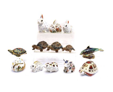 A collection of Royal Crown Derby porcelain paperweights,comprising two tortoises, largest 12cm wide, four rabbits, largest 1