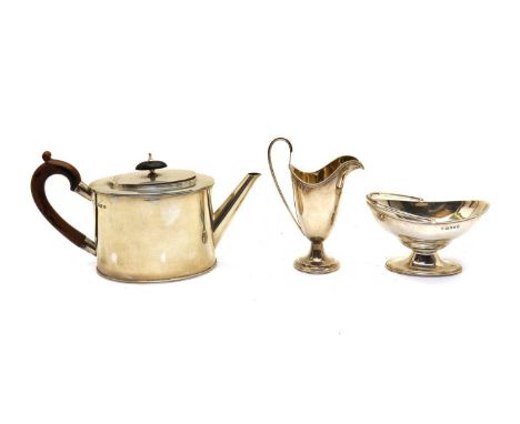 A George III style silver three piece tea service,by J B Chatterley &amp; Sons Ltd, London 1935, comprising a teapot, 27cm wi