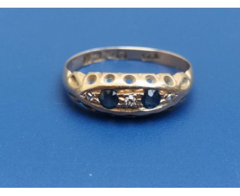 A small five stone sapphire &amp; diamond set 18ct gold  ring - Birmingham marks, 1915.  Finger size N.