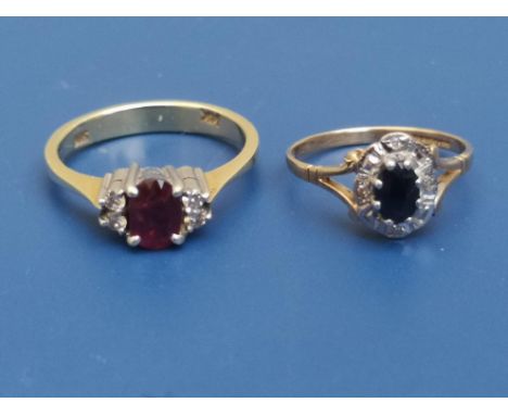 An oval ruby &amp; diamond 14kt ring and a 9ct sapphire &amp; diamond cluster ring. (2)