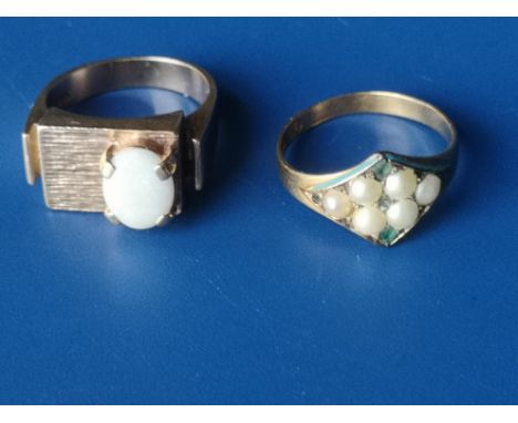 An 18ct pearl set ring and a 9ct opal ring. (2)