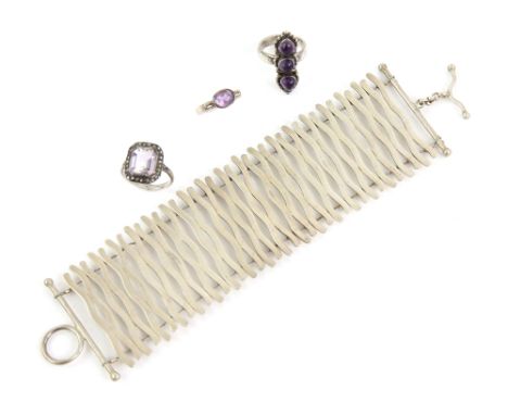 A group of mainly silver, fancy link bracelet, amethyst and marcasite ring, another single stone amethyst, both size K, charm