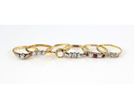 Six gold rings, Edwardian diamond three stone ring, two others similar, illusion set diamond, diamond and pearl, another with