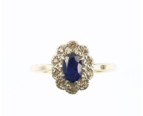 1930's sapphire and diamond ring, oval cut sapphire surrounded by Swiss cut diamonds, mounted in 18 ct and platinum, ring siz