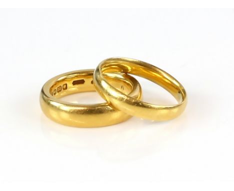 Two plain gold wedding bands, 22 ct ring sizes K &amp; M .     CONDITIONGood conditionGross weight 14.6 grams 