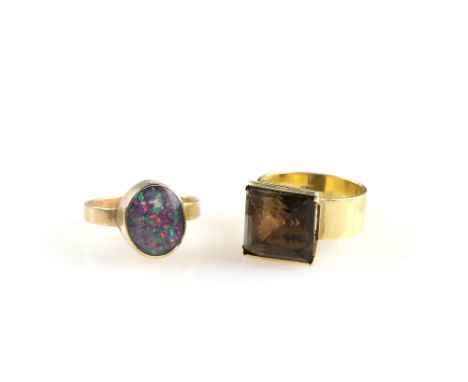 Contemporary square step cut Smokey quartz dress ring, mounted in 18 ct yellow gold, ring size L and similar opal doublet rin