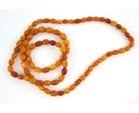 1920's amber opera length necklace, of  light to deep orange beads, length 95 cm.     CONDITIONweight 51 grams 