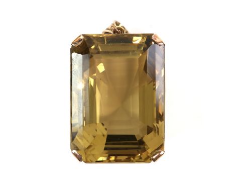 Large rectangular step-cut Citrine pendant, four-claw set, marked for 9 ct gold.     CONDITIONMeasurements of citrine 3.5 x 2