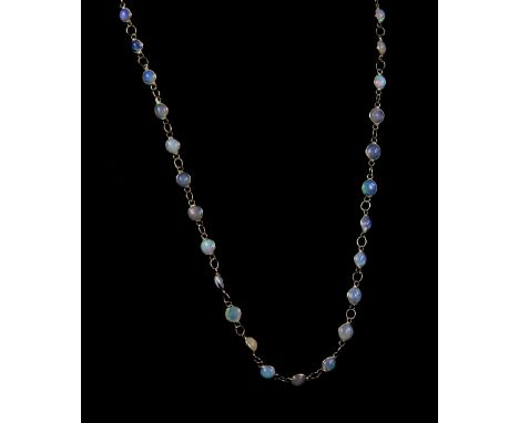 Opal necklace; round cabochon opals alternated with gold wire links, 14 ct gold, length 44cm.     CONDITION14 ct gross weight
