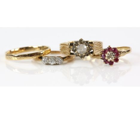 Four gold rings, Swiss cut diamond three stone rings, mounted in platinum and 9 ct, ring size K, vintage ruby and diamond clu