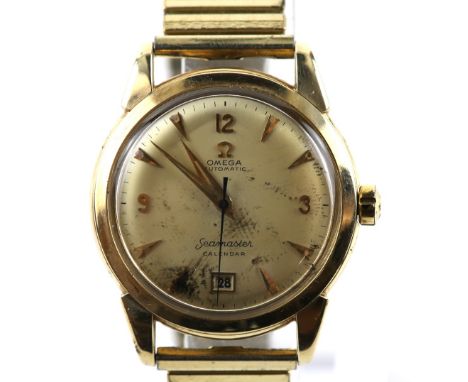 Omega; A Gentleman's Gold Seamaster calendar wristwatch, the signed dial Arabic numerals to 12 ,3 and 9, baton hour markers a