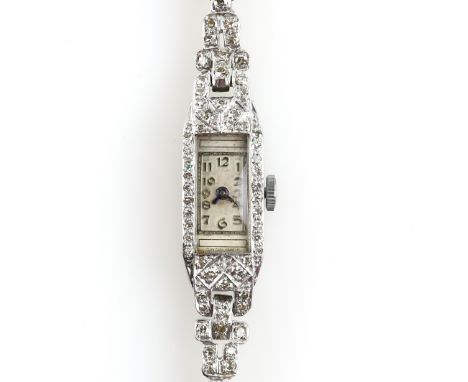 Art Deco Ladies diamond set cocktail watch, the platinum case set with Swiss cut diamonds, the dial with blue steel hands, Ar