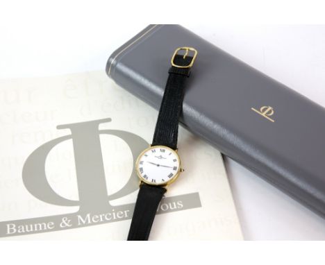 Baume Mercier a Gentleman's reference 15172 gold dress watch , the circular white enamel dial with Roman  numeral hour marker