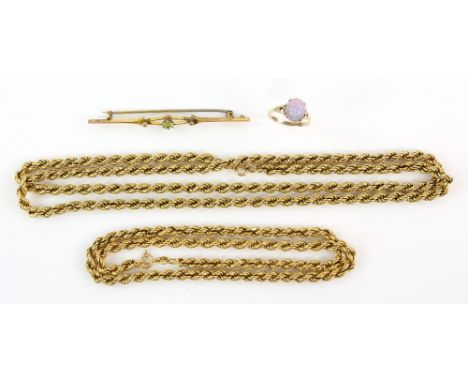 A group of gold jewellery, two gold chains, a peridot set bar brooch and a ring with faux opal, all 9 ct .     Gold chains 38