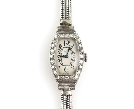 A Ladies Benson diamond cocktail watch , the signed dial with Roman numerals and set within a platinum case on 9 ct , the  be