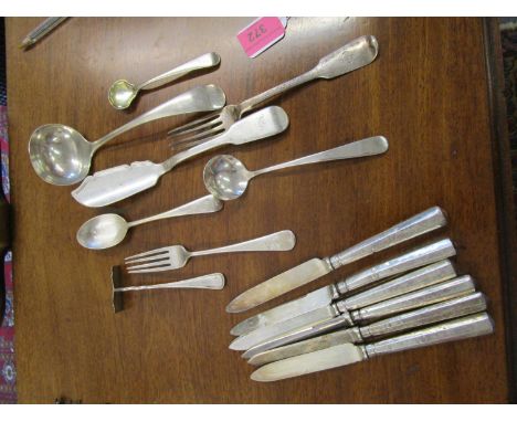 A quantity of silver flatware to include a London hallmarked ladle, a Georgian silver spoon with gilded well and engraved cre