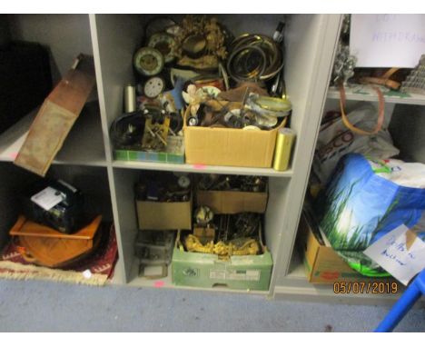 A large selection of clock movements and accessories and other items 