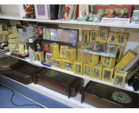 Lord of the Rings related items to include film cells, framed with prints, a set of books, a pencil case, models and related 