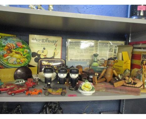 A vintage lot to include tins, sewing items, Fred Homepride canisters, books to include Snoopy annuals, Falcon and other pipe