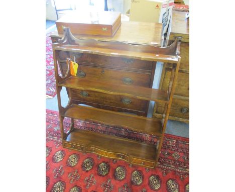 A reproduction mahogany four tier wall hanging shelf with three drawers, 36"h x 27" w 