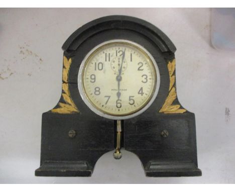An early 20th century Waltham 8 day clock fitted in a later case 