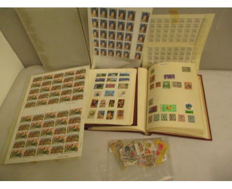 A stamp collection comprising of an album of Commonwealth, an album of world stamps Victorian and later, seven sheets of 1980