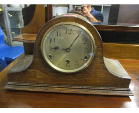 A 1930s oak cased Napoleon hat mantle clock 