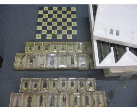 A Lord of the Rings chess set, new 