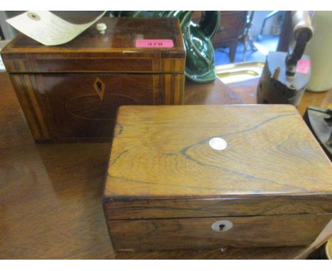 A Sheraton mahogany tea caddy with rosewood panels and inlaid decoration, fitted interior with two compartments, along with a