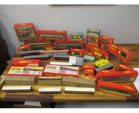 Triang, Hornby, Trix Twin Railway and other 00 gauge model railway rolling stock and related items, many boxed and various em