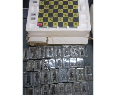 A Lord of the Rings chess set, new 