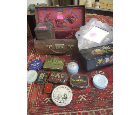 A Victorian painted papermache candle box with inset mirror, a quantity of vintage tins and a vintage Finnigans leather trave
