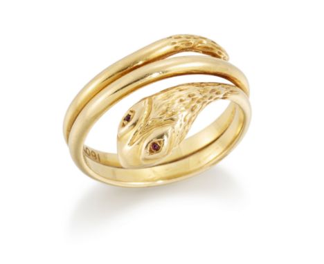 A gold coiled snake ring, with cabochon ruby eyes, stamped 18ct, ring size QCondition Report:  Weight 7.40 grams