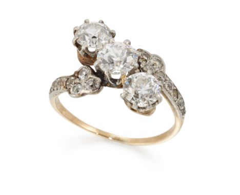 A diamond three stone crossover ring, the three old brilliant cut diamonds, with a total estimated weight of approximately 1.