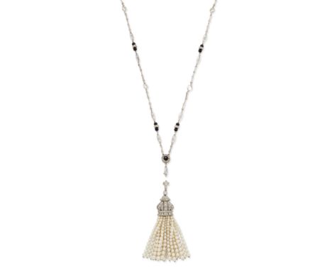 A Belle Époque diamond and seed pearl tassel pendant, the seed pearl strands suspended from a single cut diamond set crown sh