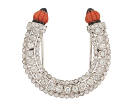 AMENDMENT: Please note the black sections are black enamel, not onyx  A diamond, coral and onyx horseshoe clip brooch, set wi