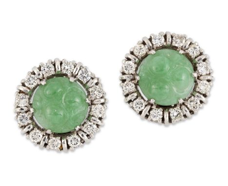 A pair of jade and diamond earclips, a carved jadeite jade cabochon with border of brilliant cut diamonds, and clip fittings,
