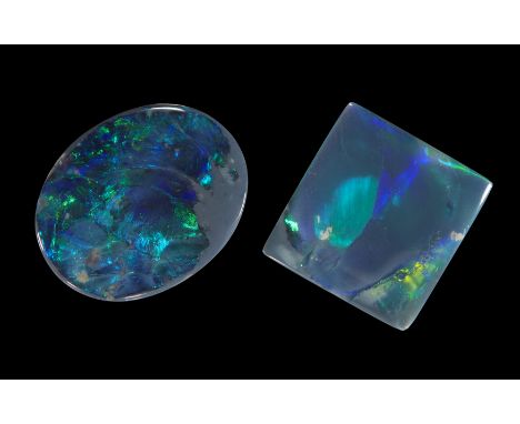 Two unmounted black opals, comprising: an oval double sided opal, 24 x 19 x 3mm, approximately 11.8 carats; and a square shap