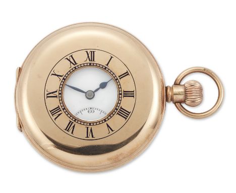 A 9ct gold half hunter keyless wind pocket watch Birmingham hallmark for 1926 Unsigned lever movement with compensated balanc