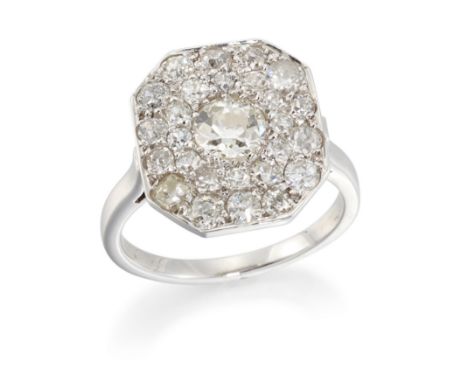 A diamond panel ring, with an old European cut diamond to the centre of the octagonal panel, pavé set with smaller old cut, S