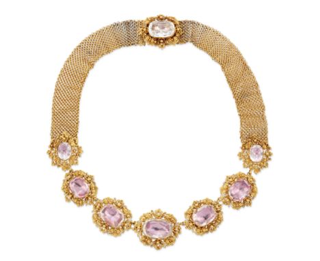 An early 19th century gold and pink foiled topaz necklace, seven graduated topaz with cannetille borders, to a textured woven