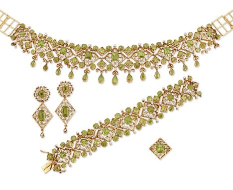 A peridot and diamond set suite, comprising a necklace, a bangle, a ring and a pair of earrings, the bracelet designed as a p