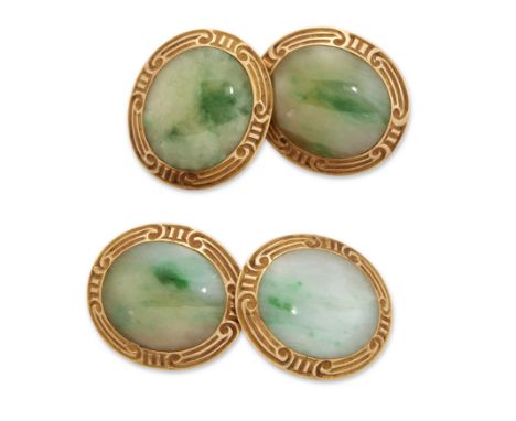 Schumann Sons. A pair of early 20th century American gold and jade cufflinks, oval panels with a jadeite jade cabochon to scr