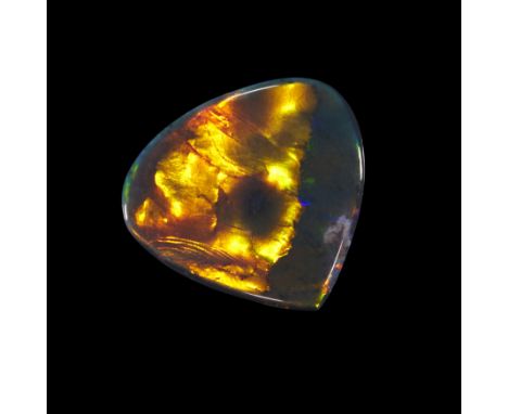 An unmounted pear shaped black opal, 20 x 21 x 5mm, approximately 11.2 carats  Provenance: The Wasserberg collection, by desc