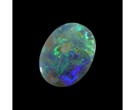 An unmounted oval crystal opal,&nbsp;17 x 12 x 5mm, approximately 6.0 caratsProvenance: The Wasserberg collection, by descent