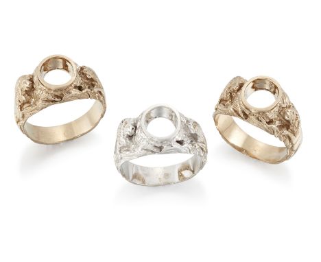 Three ring mounts, each with a vacant central collet to shoulders and hoop with relief decoration of lions and foliage, ring 