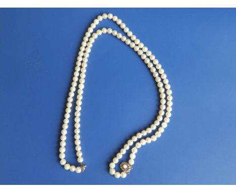 A twin strand pearl necklace with 9ct clasp