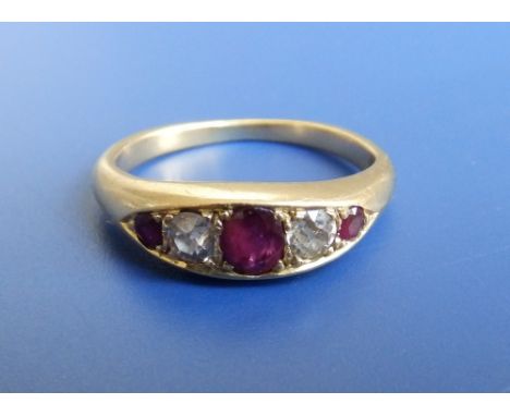 A five stone graduated ruby & diamond band ring